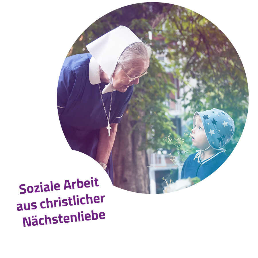 Diakonisse im Garten des Diakonissenmutterhauses in Eisenach mit einem Kind