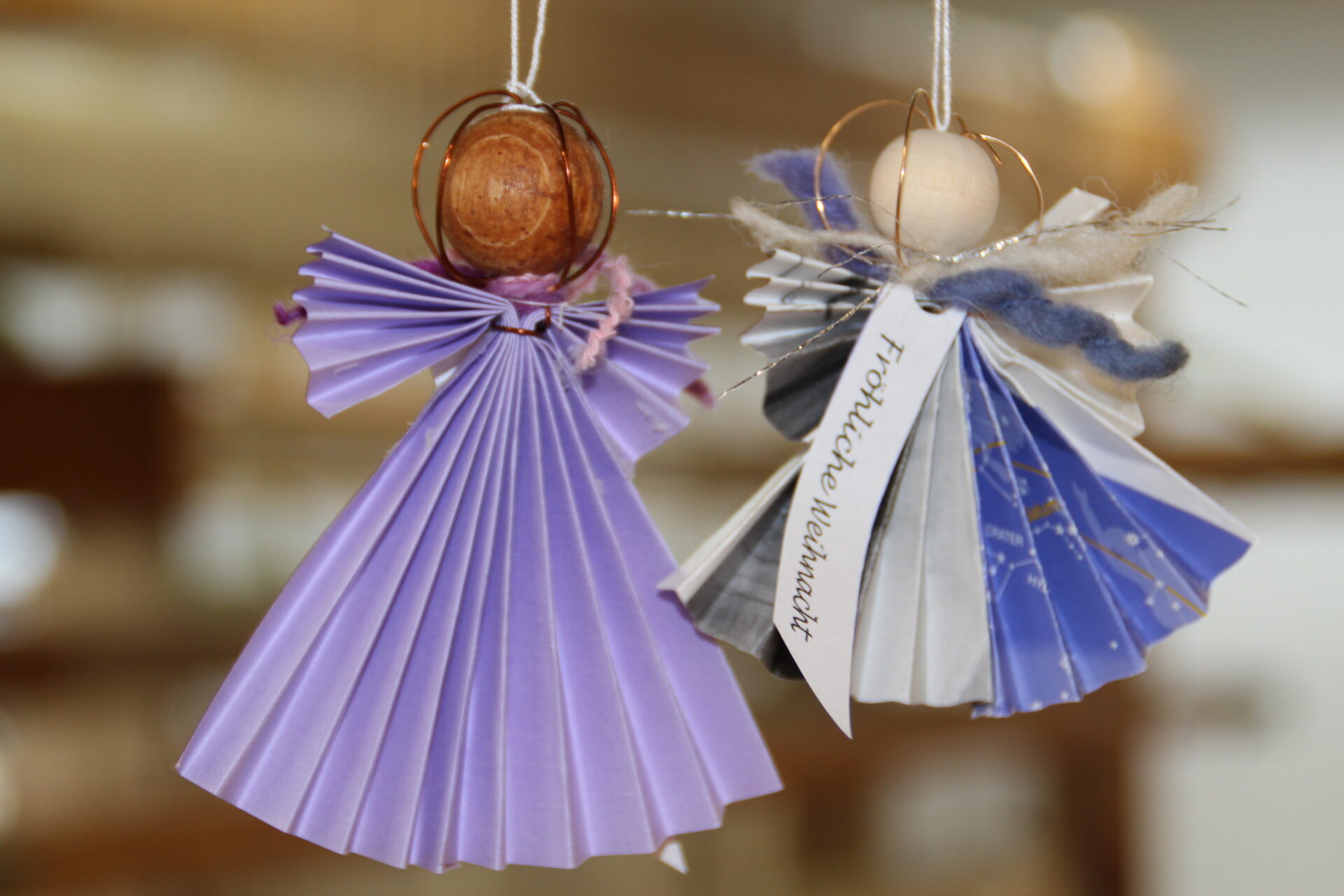 Werkstätten Christopherushof_Engel aus Papier mit Holzköpfchen